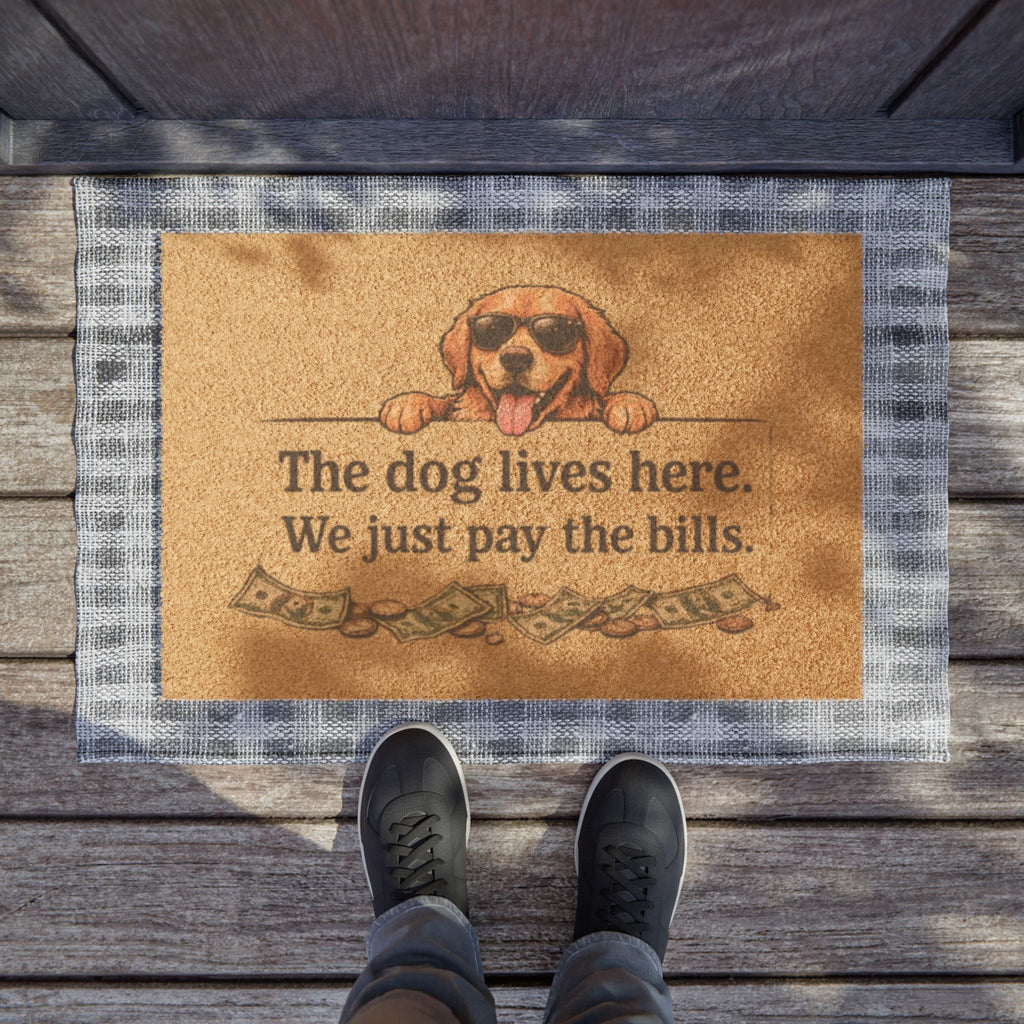 Doormat — “The Dog Lives Here, We Just Pay the Bills” Funny Welcome Mat (Dog Lover Gift)