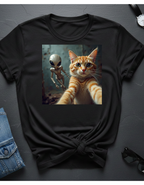 Alien Selfie T‑Shirt — Cute Ginger Cat & UFO Friend Graphic Tee